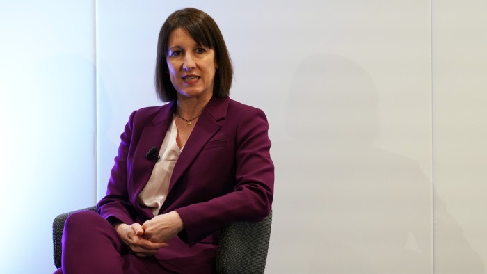 UK chancellor Rachel Reeves sitting on a chair, alone